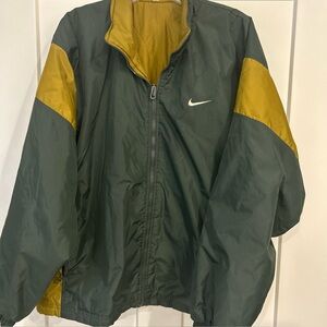 Vintage Nike Men's Dark Green and Mustard
Quilted jacket size L